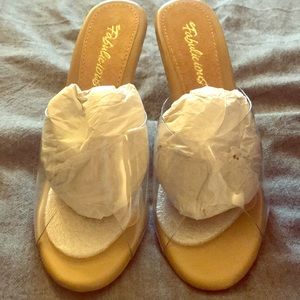 clear transparent heel size 7 M box included.